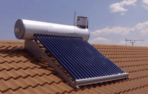 A solar water heater on the roof of a house.